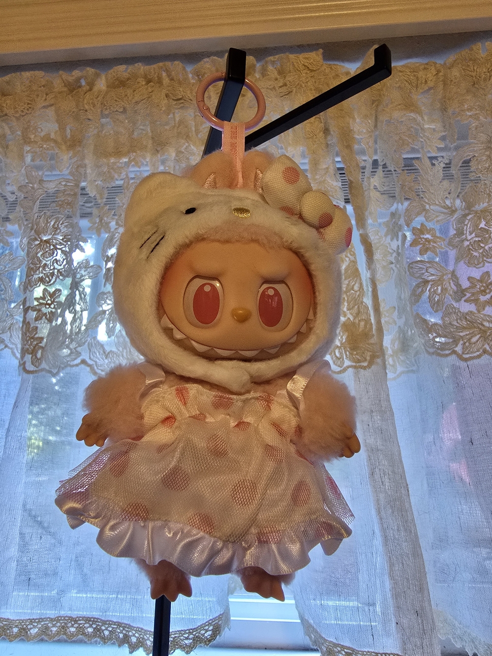 POP MART x Sanrio "The Monsters"
Labubu HELLO KITTY Plush Pendant.